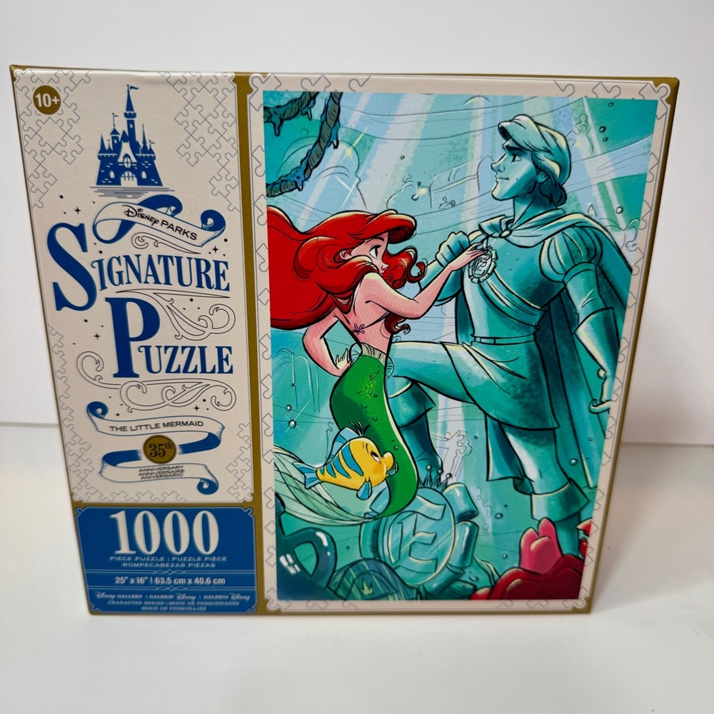 NWT. Disney Parks Signature Puzzle featuring the Little Mermaid and Prince Eric.